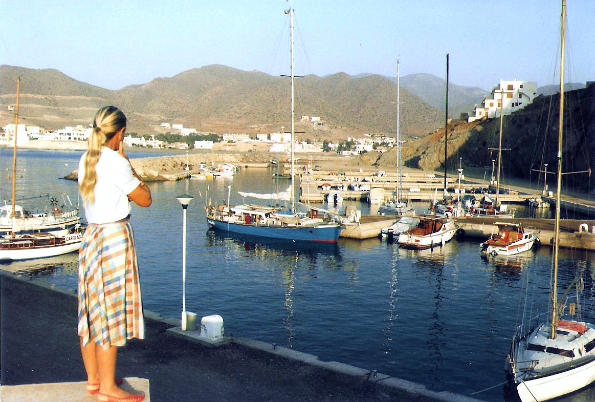 My mother at the helm leaving Funchal, Madeira.
